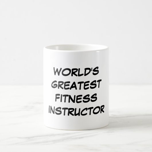 Bestster die Fitness-Lehrer-" Tasse "der Welt (Mittel)