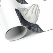 Betende Hände deckten Packpapier mit Ziegeln (Rolleneckpunkt)