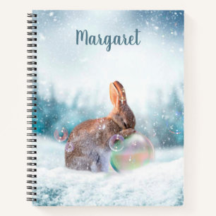 Betenes Kaninchen-Hasen-Notizbuch im Schnee Notizblock