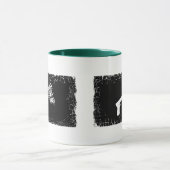 Beunruhigte Grenze 2 versah Wecker-Tasse mit Tasse (Zentrum)