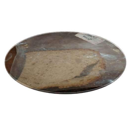 Beutel mit Scheibe Brot Schneidebrett (Ecke)