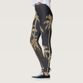 Bezauberndes Goldtropische Palmen auf Schwarzem Leggings (Links)