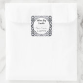 Bezeichnung für ein geometrisches, schwarzes und w quadratischer aufkleber (Tasche)