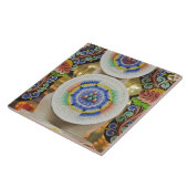 Bhutan. Zwergkuchen von Mönchen schmücken die Fliese (Seite)