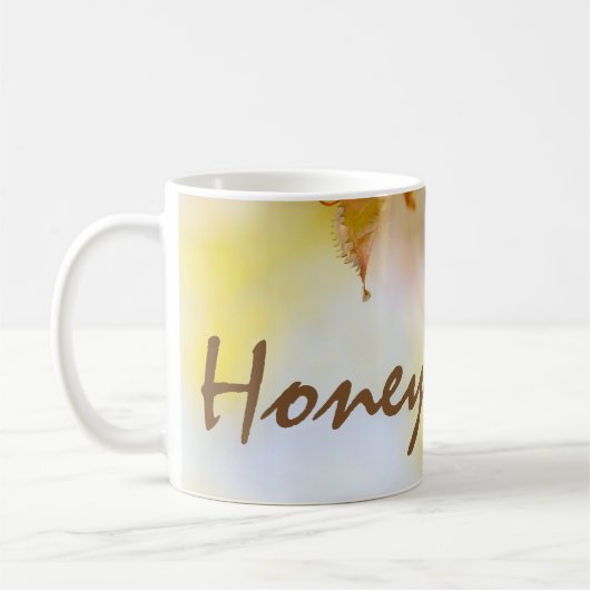 Biene auf einer Kirsche-Blume Kaffeetasse (Links)