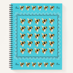 Bienen auf Blue Spiral Notebook Notizblock
