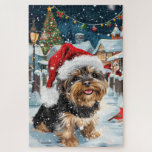 Biewer Terrier Dog Winter Wonderland Christmas Joy Puzzle<br><div class="desc">Dieses festliche Design spiegelt den fröhlichen Geist der Urlaubssaison wider und besticht durch ein hübsches Jungtier mit einer Weihnachtsmannmütze. Der Hund ist eingebettet in ein winterliches Wunderland, mit einem Schneemann, einem dekorierten Weihnachtsbaum und wunderschön verpackten Geschenken. Schneeflocken fallen sanft ab und geben der Szene eine magische Touch, während die lebhaften...</div>