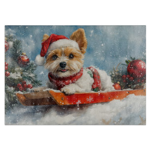 Biewer Terrier Hund im Schlitten Lass es schneien  Schneidebrett