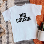 Big Cousin | Matching Family Baby T-shirt<br><div class="desc">Individuell bedruckte Bekleidung personalisiert mit "Big Cousin" Grafik oder anderen benutzerdefinierten Text. Verwenden Sie die Entwurfswerkzeuge, um die Textfarben und Schriftart zu bearbeiten oder eigene Fotos hinzuzufügen, um ein benutzerdefiniertes T - Shirt-Design zu erstellen. Wählen Sie aus einer großen Auswahl an T - Shirt, Tanklappen und Sweatshirts für Damen, Herren,...</div>