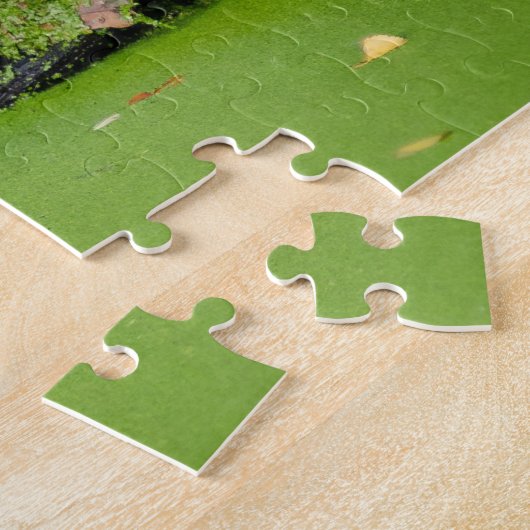 Big Tiger schwimmen mit grünen Blättern Puzzle (Seite)