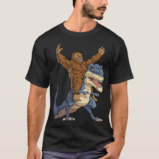 Bigfoot Riding T-Rex Funny Design T-Shirt (Vorderseite)