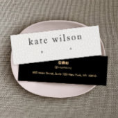 Bildkarte mit weißem Leder Texturleder mit Ohrring