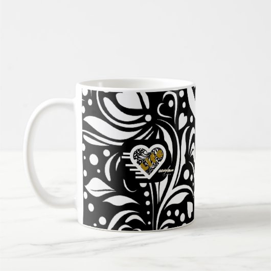 Biozid Black Tasse von Dichterin Adiela Akoo (Links)
