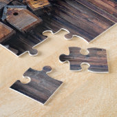 Birthäuser an der Holzwand, lustig und knifflig Puzzle (Seite)