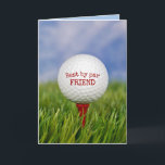 Birthday Golf Ball on T-Shirt for Friends Karte<br><div class="desc">Nahe Aufführung des Golfballs auf rotem Tee in grünem Gras zum Geburtstag eines Freundes. Alle Texte können bearbeitet werden.</div>
