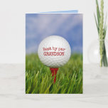 Birthday Golf Ball on T-Shirt - Grandson Karte<br><div class="desc">Nahe Aufführung des Golfballs auf rotem Tee in grünem Gras zum Geburtstag von Grandson. Alle Texte können bearbeitet werden.</div>