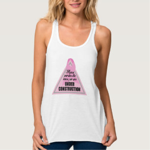 Bitte entschuldigen Sie die Unordnung, wir sind im Tank Top