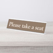 "Bitte nehmen Sie Platz. Schreibtischnamensplakette (Vorderseite )