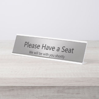 Bitte setzen Sie sich mit uns in Silver Schreibtischnamensplakette