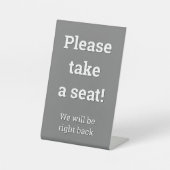 "Bitte setzen Sie sich!" Sockelschild (Vorderseite)