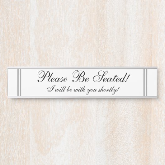 "Bitte setzen Sie! " Türschild (Vorderseite )