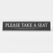 "BITTE SITZEN" SCHREIBTISCHNAMENSPLAKETTE (Vorderseite )