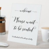 Bitte warten Sie, bis Sie Platz nehmen Sockelschild (In Situ)