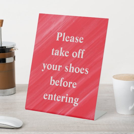 "Bitte ziehen Sie Ihre Schuhe aus, bevor Sie einst Sockelschild (In SItu)