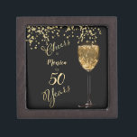 Black and Gold 50th Birthday Keepsake Kiste<br><div class="desc">Elegant keepsake for a wonderful 50th Birthday Celebration! Black and gold design with a sparkling  Champagne Glass and Glittering Bubbles. Cheers for 30, 40, 60, even a 90 year milestone birthday, Wiederparty or other event. To personalize the name and year simply go to the dropdown menu under "personalize this template"...</div>