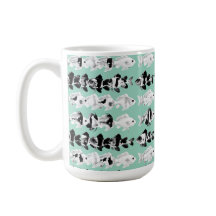 Black and white fish on teal background