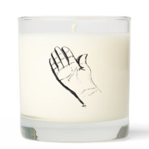 black and white hand on candle