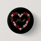 Black badge with a pink and red heart button (Vorderseite)