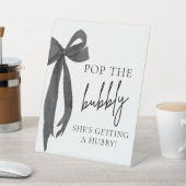 Black Bow Pop The Bubbly She's Getting Hubby Sign Sockelschild (In SItu)