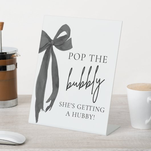 Black Bow Pop The Bubbly She's Getting Hubby Sign Sockelschild (In SItu)