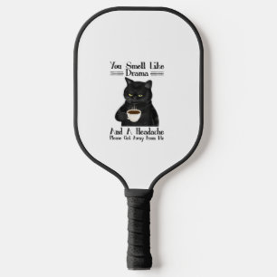 Black Cat-Kaffee riecht man wie Drama und ein Head Pickleball Schläger