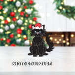 Black Cat Weihnachtsmannmütze Weihnachtsmann Ornam Fotoskulptur Ornament<br><div class="desc">Niedliche,  flauschige,  schwarze Katzengrafik mit blauen Augen,  die zu Weihnachten eine rot-weiße Weihnachtsmannmütze trägt. Schaubild: Lori@SaltTownStudio</div>