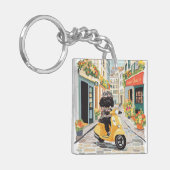 Black Doodle Riding Scooter European City Streets Schlüsselanhänger (Vorderseite links)