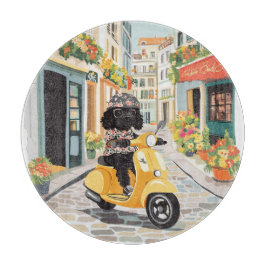 Black Doodle Riding Scooter European City Streets Schneidebrett