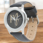 Black Gold Modern Script Monogram Name Armbanduhr<br><div class="desc">Erhöhen Sie Ihren Stil mit der Black and Gold Modern Script Monogram Name Watch. Diese Armbanduhr mit schwarzem Gesicht und kühlem Goldmonogramm in einem modernen Drehbuch-Schriftart verbindet Luxus und zeitlose Eleganz. Die hochwertige Handwerkskunst sorgt für Langlebigkeit und Präzision, während das maßgeschneiderte Monogramm eine personalisierte Touch hinzufügt, die es einzigartig macht....</div>