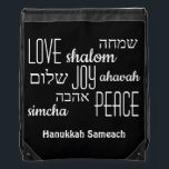 Black Hebrew Hanukkah Sportbeutel<br><div class="desc">Stilvolle HANUKKAH Drawstring Bag mit LIEBE JOY PEACE inklusive hebräischer Übersetzungen in schwarzer Typografie vor RICH BLACK Hintergrund. Text ist KUNDENBAR,  falls Sie irgendetwas ändern möchten. HAPPY HANUKKAH ist ebenfalls anpassbar,  sodass Sie durch einen Namen oder Initialen ersetzen können. Teil der HANUKKAH Kollektion. Matching-Elemente sind verfügbar.</div>