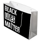 Black Lives Materie Große Geschenktüte (Rückseite Schrägansicht)