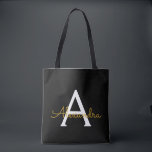 Black Name Gold Girly Script Monogram Modern Tasche<br><div class="desc">Schwarz und Gold Elegant Fügen Sie Ihren eigenen Namen Monogram Book Bag. Diese Büchertasche kann auf Ihren Vor- und Vornamen angepasst werden und als Geschenk für Weihnachten,  Geburtstag,  Brautparty oder Hochzeit.</div>