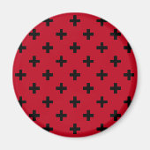 Black polka crosses on red magnet (Vorne)