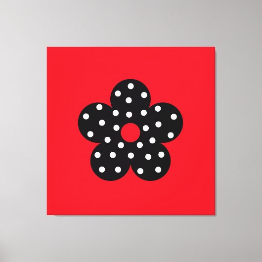 Black Polka Dot Blume über den roten Hintergrund Leinwanddruck (Vorderseite)