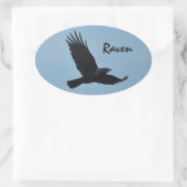 Black Raven Flying in Blue Sky Foto Ovaler Aufkleber (Tasche)