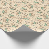 Blasglas-Ornamente auf dem hellen Pfirsichdampfer Geschenkpapier (Ecke)