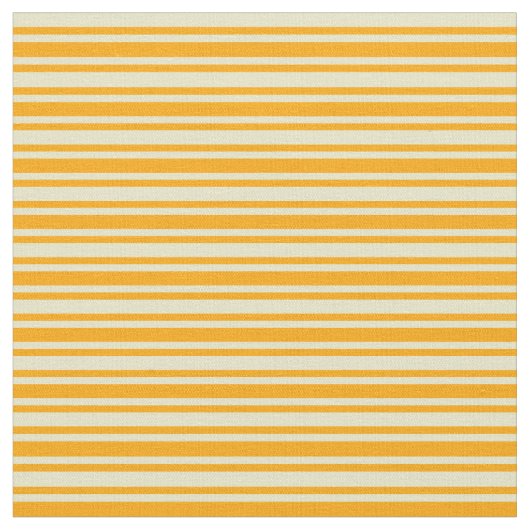 Blassgoldene und orangefarbene Muster Stoff (Nahaufnahme)