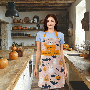 Blassrosa Halloween mit Geistern, Kürbissen, Flede Schürze