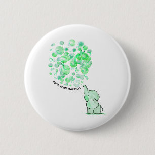 Bläst grüne Ballons für psychische Gesundheit Button
