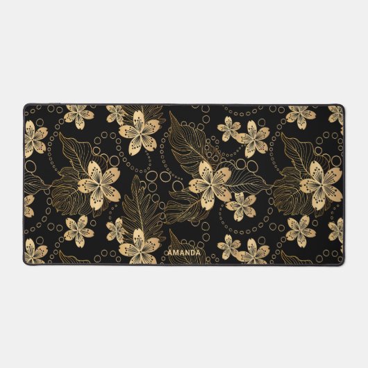 Blätter und Handschuhe aus goldfarbenen tropischen Schreibtischunterlage (Vorderseite)